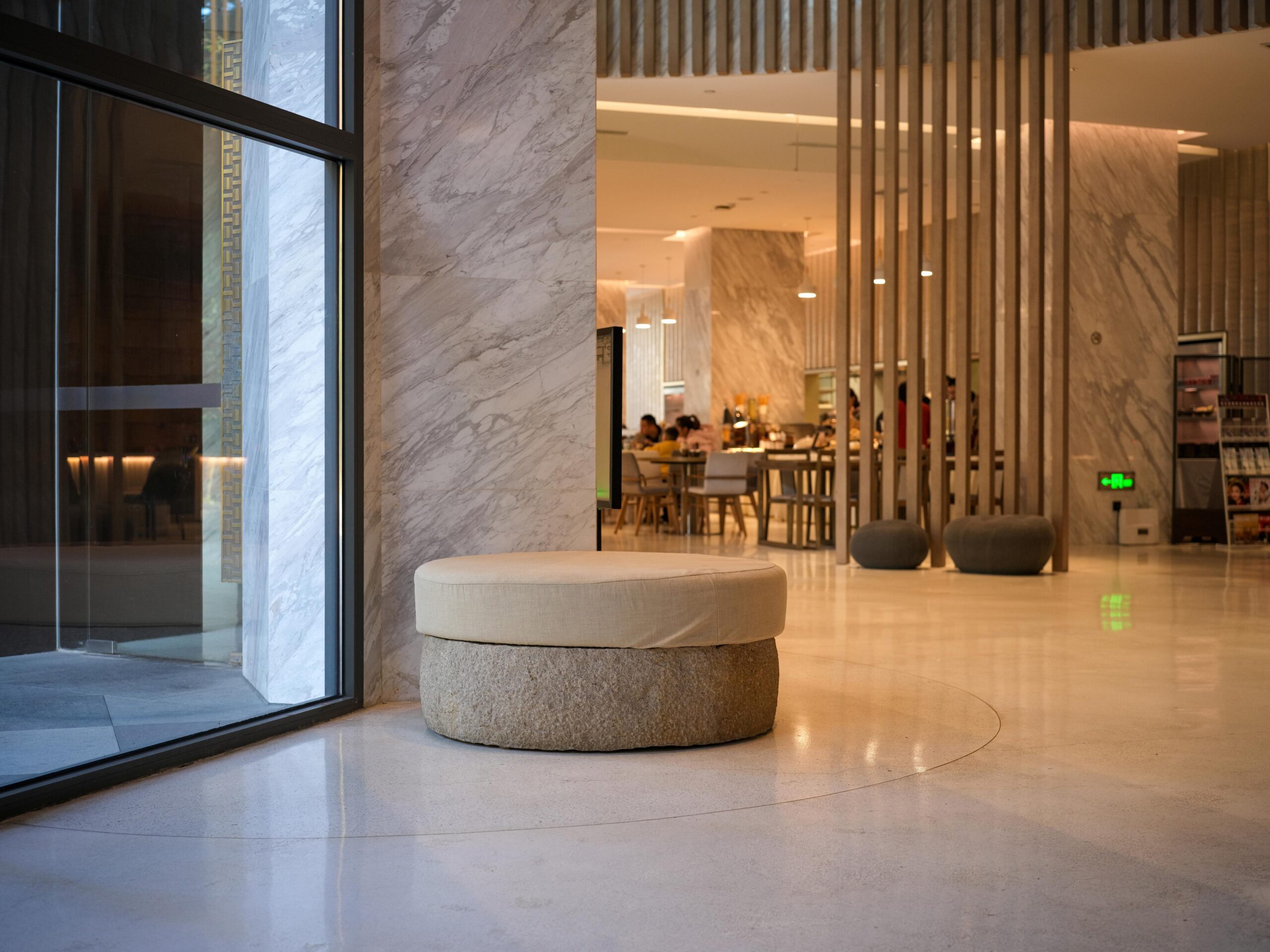 Modern lobby seating area with a stylish space separator