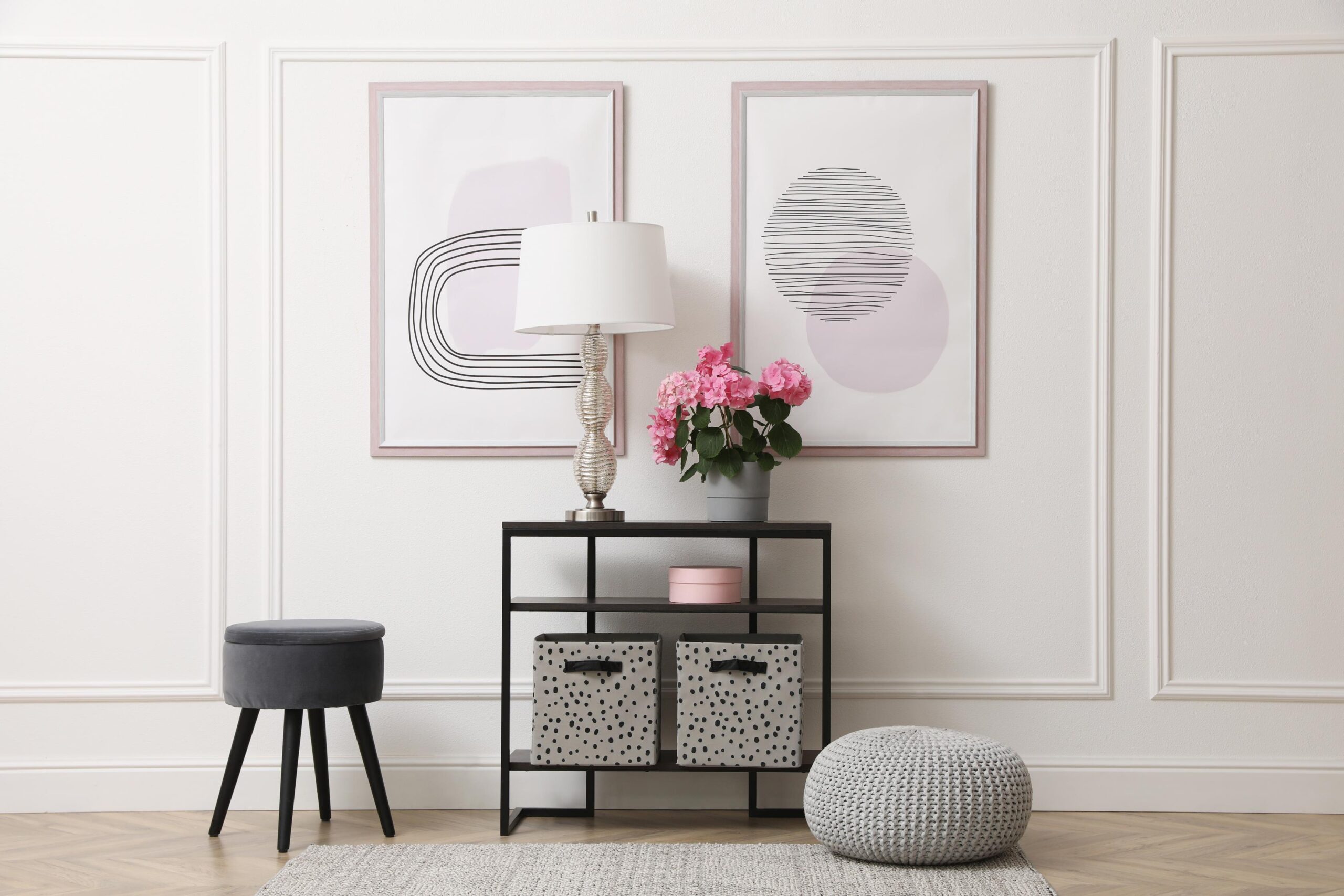 Contemporary living room featuring wall decor, indoor plants, and elegant furniture styling